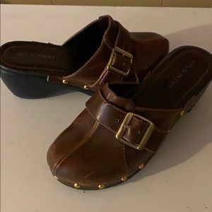Brown clogs